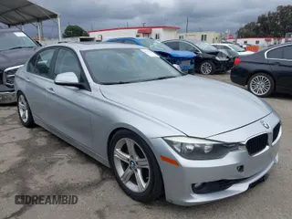 2014 BMW 3 Series 328i with VIN WBA3C1C53EK109613, listed as a IAAI auction lot 41713060 with 141,240 mi miles. Bid and sale history available at carsss.com. Image 1.