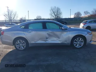 2018 Chevrolet Impala LT with VIN 2G1105SA8J9157511, listed as a IAAI auction lot 41825641 with 140,316 mi miles and . Bid and sale history available at DreamBid. Image 13.