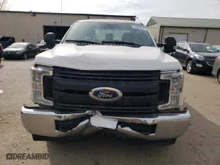 2017 Ford Super Duty F-250 SRW XLT with VIN 1FT7X2A60HEF21937, listed as a Copart auction lot 77828424 with 98,679 mi miles and Salvage Title. Bid and sale history available at carsss.com. Image 5.