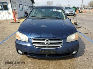2002 Nissan Maxima GLE z VIN JN1DA31A52T301567, wystawiony jako Copart lot #51479115 z przebiegiem 122 327 mil mil oraz Szkoda całkowita • Salvage title. Historia ofert i sprzedaży dostępna na DreamBid. Obrazek 5.