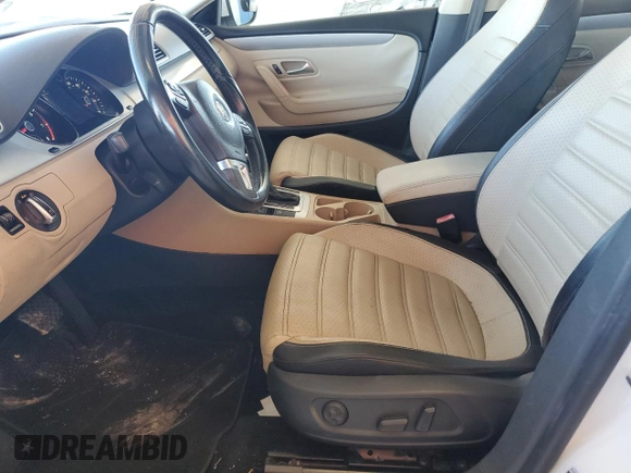 2014 Volkswagen CC R-Line with VIN WVWBP7AN6EE521807, listed as a Copart auction lot 74177764 with 142,779 mi miles and Clean Title. Bid and sale history available at carsss.com. Image 7.