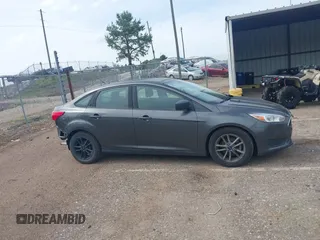 2018 Ford Focus SE with VIN 1FADP3F29JL288761, listed as a IAAI auction lot 42290510 with 93,463 mi miles and . Bid and sale history available at DreamBid. Image 14.