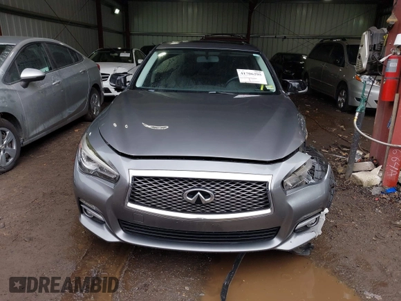 2015 Infiniti Q50 Premium z VIN JN1BV7ARXFM411040, wystawiony jako IAAI lot #41706295 z przebiegiem 97 297 mil mil oraz . Historia ofert i sprzedaży dostępna na DreamBid. Obrazek 12.