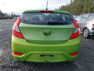 2012 Hyundai Accent GS with VIN KMHCT5AE9CU021238, listed as a IAAI auction lot 41762650 with 166,287 mi miles. Bid and sale history available at carsss.com. Image 17.