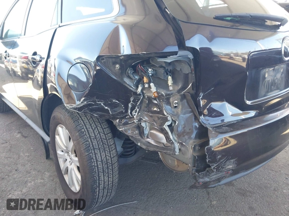 2012 Mazda CX-7 i Touring z VIN JM3ER2CMXC0421774, wystawiony jako IAAI lot #41743231 z przebiegiem 132 488 mil mil oraz . Historia ofert i sprzedaży dostępna na DreamBid. Obrazek 13.