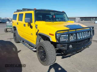 2005 Hummer H2 SUV with VIN 5GRGN23U65H120306, listed as a IAAI auction lot 41712021 with 141,894 mi miles. Bid and sale history available at carsss.com. Image 1.