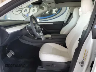 2023 Tesla Model Y Long Range with VIN 7SAYGDEE8PF620703, listed as a Copart auction lot 54655105 with 29,538 mi miles and Salvage Title. Bid and sale history available at DreamBid. Image 7.