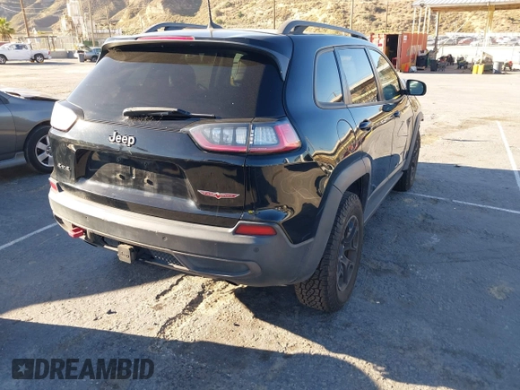 2019 Jeep Cherokee Trailhawk with VIN 1C4PJMBX1KD441175, listed as a IAAI auction lot 42506246 with 47,760 mi miles and . Bid and sale history available at DreamBid. Image 4.
