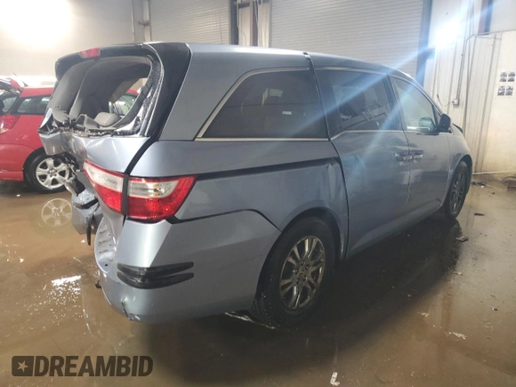 2013 Honda Odyssey EX-L with VIN 5FNRL5H64DB080141, listed as a Copart auction lot 49553235 with 128,358 mi miles and Salvage Title. Bid and sale history available at carsss.com. Image 3.