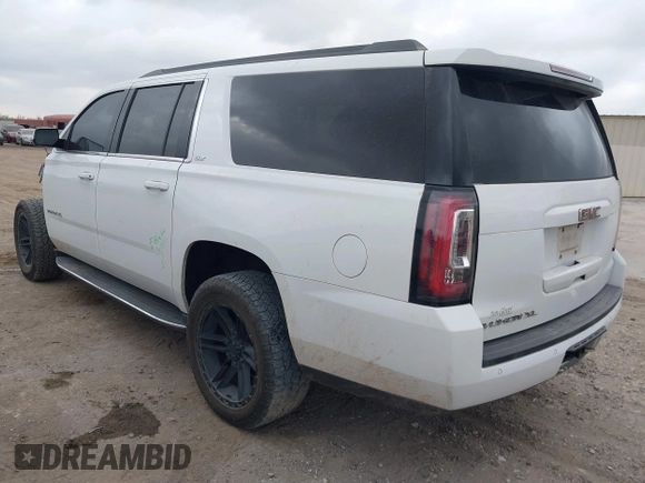 2019 GMC Yukon XL SLT with VIN 1GKS1GKC1KR384332, listed as a IAAI auction lot 41232450 with 109,219 mi miles. Bid and sale history available at carsss.com. Image 3.
