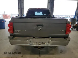 2005 Dodge Dakota SLT с VIN 1D7HW42N95S131964, выставлен на аукционе Copart как лот 53836925 с пробегом 117 094 миль миль и Списание • Salvage title. История ставок и продаж доступна на DreamBid. Изображение 6.