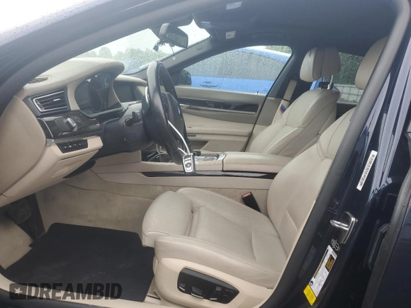 2015 BMW 7 Series 750Li z VIN WBAYE8C51FD781314, wystawiony jako Copart lot #56537395 z przebiegiem 69 682 mil mil oraz Szkoda całkowita • Salvage title. Historia ofert i sprzedaży dostępna na DreamBid. Obrazek 7.