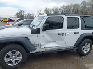 2018 Jeep Wrangler Unlimited Sport z VIN 1C4HJXDN3JW142453, wystawiony jako IAAI lot #41889589 z przebiegiem 53 693 mil mil oraz . Historia ofert i sprzedaży dostępna na DreamBid. Obrazek 6.