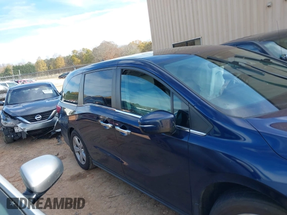 2019 Honda Odyssey EX-L with VIN 5FNRL6H72KB090503, listed as a IAAI auction lot 40958508 with 101,597 mi miles. Bid and sale history available at carsss.com. Image 14.