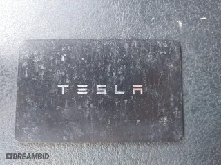 2018 Tesla Model 3 Long Range Battery with VIN 5YJ3E1EA4JF157782, listed as a IAAI auction lot 41774169 with 123,239 mi miles. Bid and sale history available at carsss.com. Image 11.