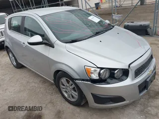 2012 Chevrolet Sonic LT z VIN 1G1JD6SB4C4164979, wystawiony jako IAAI lot #41504074 z przebiegiem 85 502 mil mil oraz . Historia ofert i sprzedaży dostępna na DreamBid. Obrazek 1.