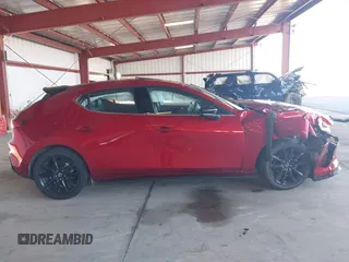 2021 Mazda 3 Premium Plus z VIN JM1BPBNY3M1332643, wystawiony jako IAAI lot #41536777 z przebiegiem 43 075 mil mil oraz . Historia ofert i sprzedaży dostępna na DreamBid. Obrazek 13.