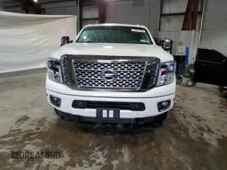 2017 Nissan Titan Pro-4X with VIN 1N6BA1F46HN574314, listed as a Copart auction lot 55573985 with 98,812 mi miles and Salvage title. Bid and sale history available at DreamBid. Image 5.
