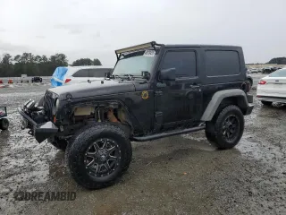 2009 Jeep Wrangler X with VIN 1J4FA241X9L735743, listed as a Copart auction lot 48109455 with 232,110 mi miles and Salvage Title. Bid and sale history available at DreamBid. Image 1.