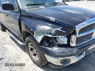 2002 Dodge 1500 z VIN 3D7HA18N62G174150, wystawiony jako IAAI lot #42190228 z przebiegiem 159 047 mil mil oraz . Historia ofert i sprzedaży dostępna na DreamBid. Obrazek 6.