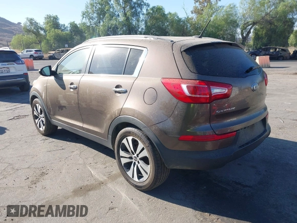 2013 Kia Sportage EX with VIN KNDPC3A23D7465943, listed as a IAAI auction lot 42828113 with 222,309 mi miles and . Bid and sale history available at DreamBid. Image 3.
