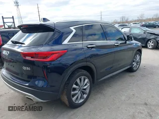2021 Infiniti QX50 Luxe with VIN 3PCAJ5BB7MF123895, listed as a IAAI auction lot 41811100 with 23,164 mi miles and . Bid and sale history available at DreamBid. Image 4.