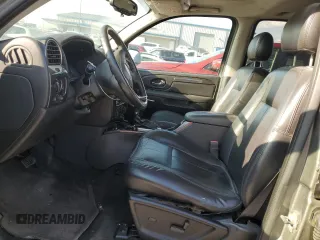 2006 GMC Envoy SLE with VIN 1GKET16S766147308, listed as a Copart auction lot 71669374 with 237,254 mi miles and Salvage Title. Bid and sale history available at DreamBid. Image 7.