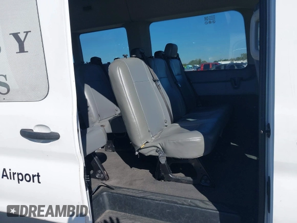2016 Ford Transit Passenger XL z VIN 1FBZX2CM2GKB51339, wystawiony jako IAAI lot #41429005 z przebiegiem 215 896 mil mil oraz . Historia ofert i sprzedaży dostępna na DreamBid. Obrazek 8.
