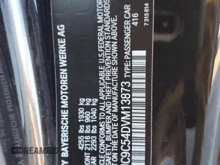 2013 BMW 1 Series 135i with VIN WBAUC9C54DVM13873, listed as a Copart auction lot 82657734 with 78,021 mi miles and Salvage title. Bid and sale history available at DreamBid. Image 14.