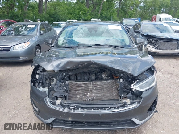 2020 Ford Fusion Titanium with VIN 3FA6P0RUXLR182120, listed as a IAAI auction lot 42351542 with 141,746 mi miles and . Bid and sale history available at DreamBid. Image 6.