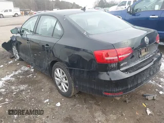 2015 Volkswagen Jetta S z VIN 3VW1K7AJ0FM353565, wystawiony jako IAAI lot #41402448 z przebiegiem 112 728 mil mil oraz . Historia ofert i sprzedaży dostępna na DreamBid. Obrazek 3.