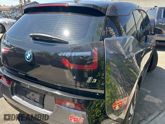 2017 BMW i3 with VIN WBY1Z6C3XH7A39752, listed as a Copart auction lot 64908323 with 38,219 mi miles. Bid and sale history available at carsss.com. Image 4.