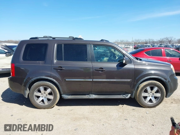 2012 Honda Pilot Touring with VIN 5FNYF4H99CB069996, listed as a IAAI auction lot 41809046 with 140,836 mi miles and . Bid and sale history available at DreamBid. Image 13.
