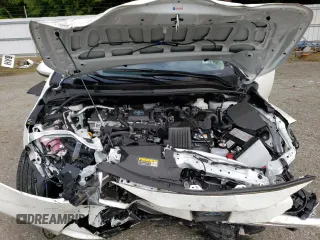 2023 Toyota Corolla Hybrid LE with VIN JTDBDMHE2PJ002549, listed as a Copart auction lot 50378594 with 5,028 mi miles and Salvage Title. Bid and sale history available at carsss.com. Image 13.