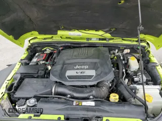 2016 Jeep Wrangler Rubicon z VIN 1C4BJWCG7GL293843, wystawiony jako Copart lot #71455124 z przebiegiem 65 432 mil mil oraz Szkoda całkowita • Salvage title. Historia ofert i sprzedaży dostępna na DreamBid. Obrazek 12.