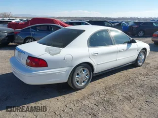 2003 Mercury Sable LS Premium with VIN 1MEHM55S73G630347, listed as a IAAI auction lot 41427588 with 125,285 mi miles. Bid and sale history available at carsss.com. Image 4.
