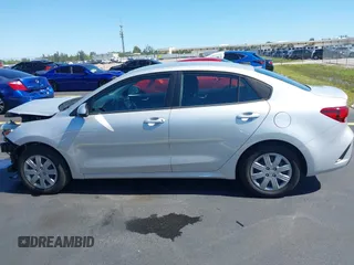 2023 Kia Rio S z VIN 3KPA24AD4PE592446, wystawiony jako IAAI lot #42244022 z przebiegiem 13 759 mil mil oraz . Historia ofert i sprzedaży dostępna na DreamBid. Obrazek 15.