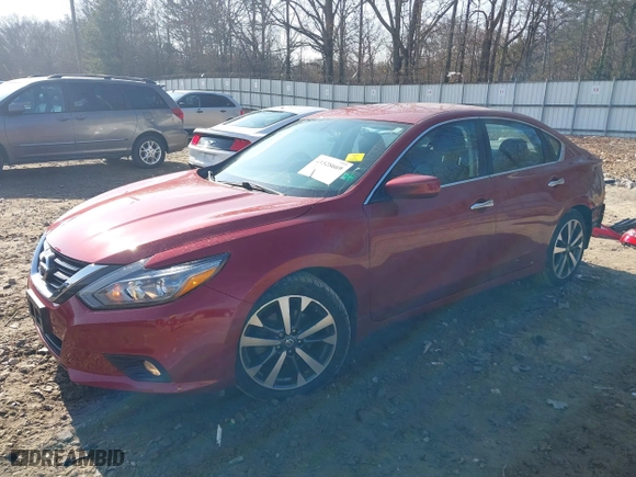 2016 Nissan Altima 2.5 SL with VIN 1N4AL3APXGC281084, listed as a IAAI auction lot 41528669 with 59,201 mi miles. Bid and sale history available at carsss.com. Image 18.