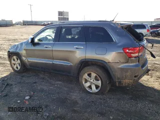 2013 Jeep Grand Cherokee Overland with VIN 1C4RJFCG0DC607214, listed as a Copart auction lot 43672575 with 188,026 mi miles and Salvage Title. Bid and sale history available at carsss.com. Image 2.