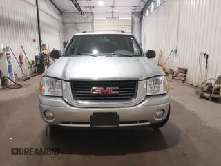 2004 GMC Envoy SLE with VIN 1GKDT13S042243883, listed as a IAAI auction lot 41795335 with 162,873 mi miles. Bid and sale history available at carsss.com. Image 12.