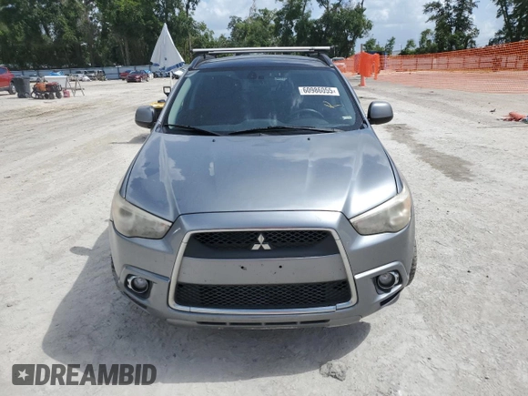 2011 Mitsubishi Outlander SE z VIN JA4AR4AU1BZ011732, wystawiony jako Copart lot #60986055 z przebiegiem Nie podano mil oraz Czysty tytuł • Clean title. Historia ofert i sprzedaży dostępna na DreamBid. Obrazek 5.