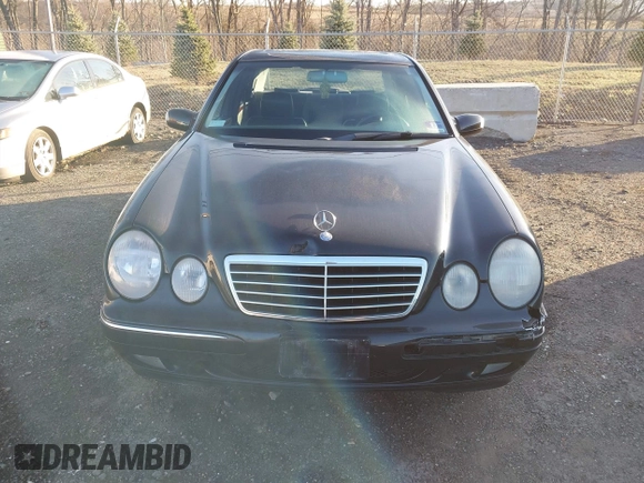 2000 Mercedes-Benz E-Class with VIN WDBJF65J1YB058351, listed as a IAAI auction lot 41834603 with 100,525 mi miles. Bid and sale history available at carsss.com. Image 12.