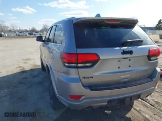 2015 Jeep Grand Cherokee Altitude with VIN 1C4RJFAG3FC210151, listed as a IAAI auction lot 41865151 with 122,579 mi miles. Bid and sale history available at carsss.com. Image 3.