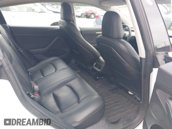 2023 Tesla Model 3 z VIN 5YJ3E1EA9PF431356, wystawiony jako IAAI lot #42620155 z przebiegiem 101 626 mil mil oraz . Historia ofert i sprzedaży dostępna na DreamBid. Obrazek 8.