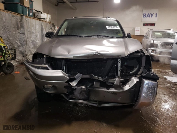 2006 GMC Envoy SLE with VIN 1GKDT13S762185578, listed as a Copart auction lot 44587735 with 310,991 mi miles and Salvage Title. Bid and sale history available at carsss.com. Image 5.