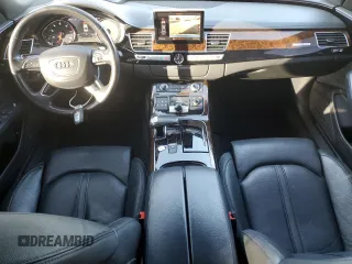 2017 Audi A8 z VIN WAU44AFD0HN010187, wystawiony jako Copart lot #54186365 z przebiegiem 78 095 mil mil oraz Szkody całkowita. Historia ofert i sprzedaży dostępna na DreamBid. Obrazek 8.