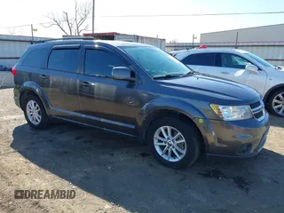 2014 Dodge Journey SXT with VIN 3C4PDCBG6ET192288, listed as a IAAI auction lot 41787594 with 132,973 mi miles. Bid and sale history available at carsss.com. Image 1.