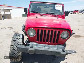2000 Jeep Wrangler Sport with VIN 1J4FA49S0YP731544, listed as a IAAI auction lot 42570831 with Not provided miles and . Bid and sale history available at DreamBid. Image 13.