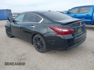 2018 Nissan Altima 2.5 SR with VIN 1N4AL3AP3JC298848, listed as a IAAI auction lot 40966335 with 121,163 mi miles. Bid and sale history available at carsss.com. Image 3.