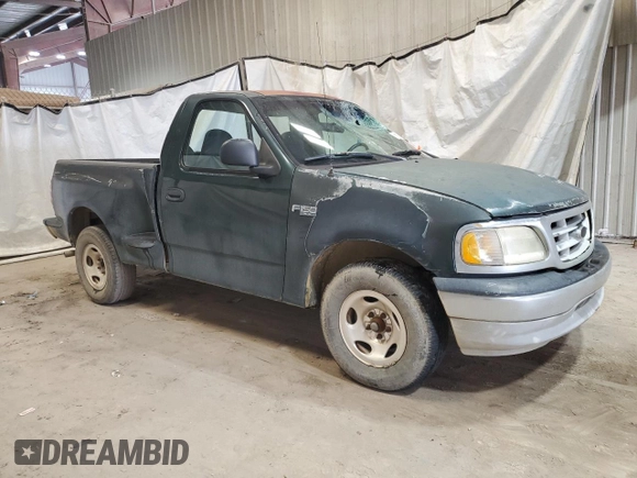 2003 Ford F-150 XL with VIN 1FTRF07223KB96495, listed as a Copart auction lot 63028535 with 217,315 mi miles and Clean title. Bid and sale history available at DreamBid. Image 4.